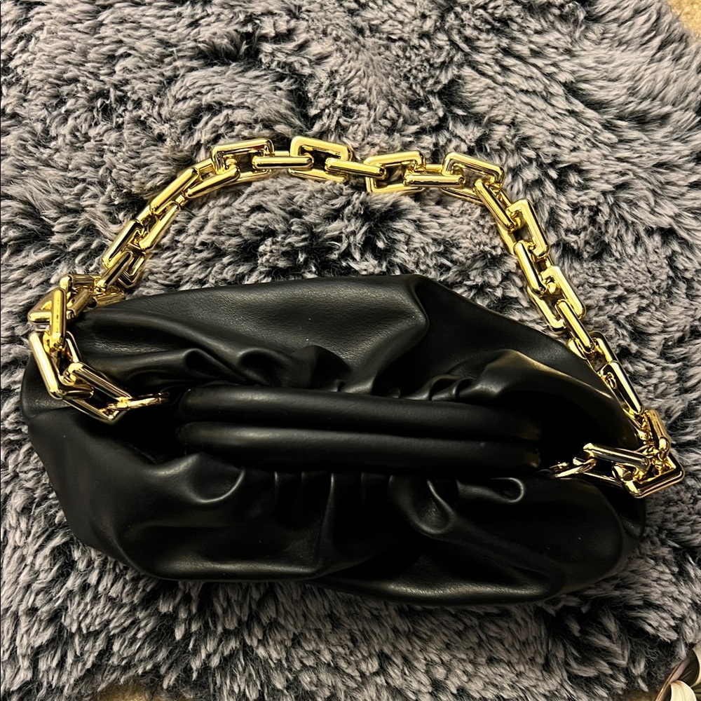 Elegant Black Leather Bag with Gold Chain